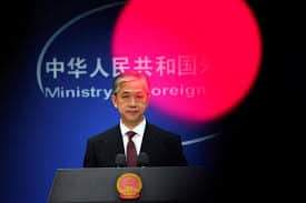 China vows retaliation if any U.S. action against journalists