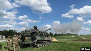 Photo: US Army - FILE - Ukrainian artillerymen fire a self-propelled howitzer during training at Grafenwoehr Training Area, Germany, May 12, 2022. The US is sending another $1 billion in military aid to Ukraine.