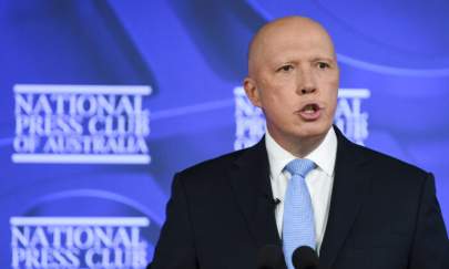 Australian Defence Minister Peter Dutton addresses the National Press Club in Canberra, Australia on Nov. 26, 2021. (AAP Image/Lukas Coch)