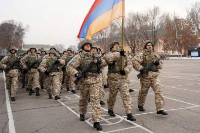 Vladimir Tretyakov/NUR.KZ via AP Armenian peacekeepers of the Collective Security Treaty Organization attend the official ceremony of starting withdraw its troops in Almaty, Kazakhstan, Jan. 13, 2022.