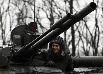 Reuters/SERGEY PIVOVAROV FILE PHOTO: Russian service members hold drills in the Rostov region