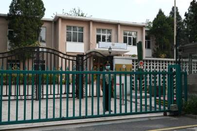 A Chinese paramilitary policeman stands guard outside the Afghan Embassy in Beijing on July 9. GREG BAKER/AFP VIA GETTY IMAGES