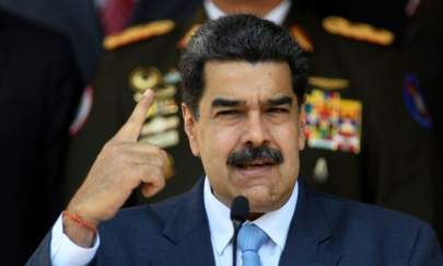 Venezuelan President Nicolas Maduro gives a press conference at the Miraflores presidential palace in Caracas, Venezuela, on March 12, 2020. (Matias Delacroix/AP Photo)