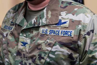 Col. Richard Bourquin, Space Delta 4 commander, poses for a detailed photo of his new U.S. Space Force patches after commissioning into the USSF at Buckley Air Force Base, Colo., Jan. 5. Bourquin has spent 25 years in the Air Force working in space operations. (Airman 1st Class Joshua T. Crossman/Space Force) 