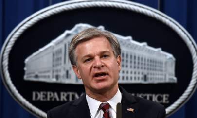 Federal Bureau of Investigation Director Christopher Wray during a press conference at the Department of Justice in Washington on Sept. 22, 2020. (OLIVIER DOULIERY/POOL/AFP via Getty Images)