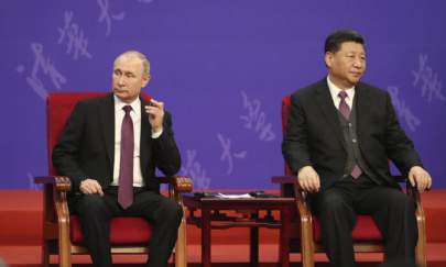 Russian President Vladimir Putin (L) and Chinese President Xi Jinping (R) attend the Tsinghua Universitys ceremony, at Friendship Palace on April 26, 2019 in Beijing, China. (Kenzaburo Fukuhara - Pool/Getty Images)