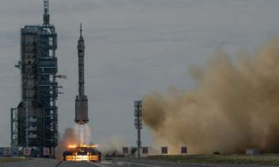 The manned Shenzhou-12 spacecraft from China's Manned Space Agency onboard the Long March-2F rocket launches with three Chinese astronauts onboard at the Jiuquan Satellite Launch Center in China's Gansu Province, on June 17, 2021. (Kevin Frayer/Getty Images)