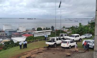 Police stand guard outside Parliament in Honiara, Guadalcanal Island in the Solomon Islands, on Dec. 6, 2021 (Mavis Podokolo/AFP via Getty Images)