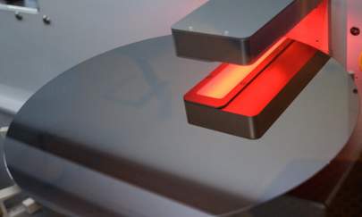 300-millimeter wafers are pictured in a machine for coating with gold in a clean room during the mass production of semiconductor chips at the Bosch's semiconductor plant in Dresden, eastern Germany, on July 12, 2022. (Jens Schlueter/AFP via Getty Images)