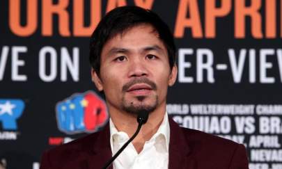 Presidential candidate Manny Pacquiao speaking at a press conference announcing an upcoming 12-round world welterweight championship contest at the Beverly Hills Hotel in California, Jan. 19, 2016. (Chris Farina/AFP/Getty Images)