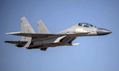 A Chinese PLA J-16 fighter jet flies in an undisclosed location in a file photo. (Taiwan Ministry of Defense via AP)