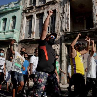 Cuba approves laws granting greater rights as criticism of protesters' arrests heats up