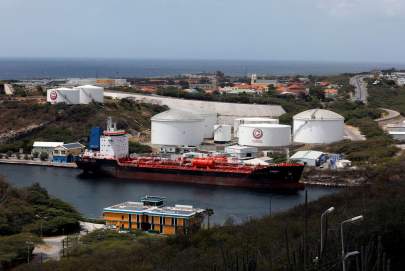 A crude oil tanker is docked at Isla Oil Refinery PDVSA terminal in Willemstad on the island of Curacao, February 22, 2019. REUTERS/Henry Romero/File Photo