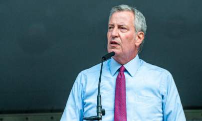 New York City Mayor Bill DeBlasio presents a proclamation at the 46th Precincts National Night Out in the Bronx borough of New York City, on Aug. 3, 2021. (David Dee Delgado/Getty Images)