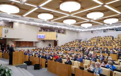 Russian Prime Minister Mikhail Mishustin gives a report on the government's work over the previous year at the Duma, the lower chamber of Russia's parliament, in Moscow on May 12, 2021. (Dmitry Astakhov/SPUTNIK/AFP via Getty Images)