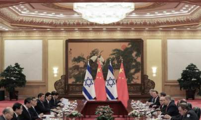 Chinese Premier Li Keqiang (4nd-L) meets with Israel Prime Minister Benjamin Netanyahu (3nd-R) at the Great Hall of the People in Beijing, China, on March 20, 2017. (Lintao Zhang/Pool/Getty Images)