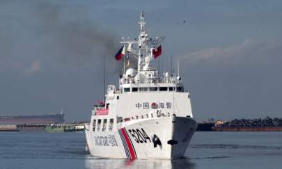 A Chinese Coast Guard ship prepares to anchor at Manila port for a port call on Jan. 14, 2020. (AFP via Getty Images)