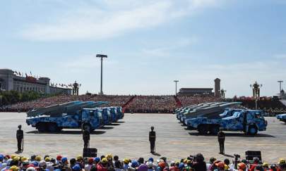 Military vehicles carrying cruise missiles are displayed in a military parade at Tiananmen Square in Beijing on Sept. 3, 2015. (Greg Baker/AFP/Getty Images)