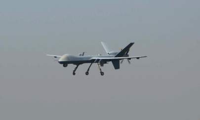 A U.S. drone aircraft lands at Afghanistan's Jalalabad Airport where a U.S. C-130 military transport plane crashed in Jalalabad on Oct. 2, 2015. (Noorullah Shirzada/AFP/Getty Images)