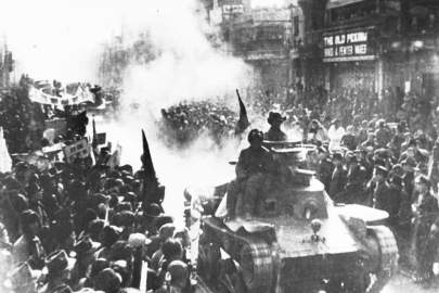 A column of Chinese Communist light tanks entered the streets of Beijing, formerly known as Peking, on May 2, 1949, after the withdrawal of Chiang Kai-shek