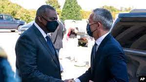 AP - Secretary of Defense Lloyd Austin, left, greets NATO Secretary General Jens Stoltenberg upon his arrival at the Pentagon, Oct. 4, 2021.