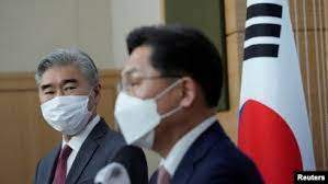 Reuters - US Special Representative for North Korea, Sung Kim, watches as South Korea's Special Representative for Korean Peninsula Peace and Security Affairs Noh Kyu-duk speaks during a briefing at the Foreign Ministry in Seoul, South Korea, Apr. 18, 2022.