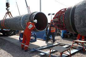 FILE PHOTO: Workers are seen at the construction site of the Nord Stream 2 gas pipeline, near the town of Kingisepp, Leningrad region, Russia, June 5, 2019. REUTERS/Anton Vaganov/File Photo