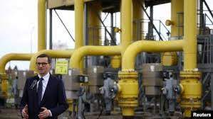 Reuters - Poland's Prime Minister Mateusz Morawiecki speaks during a news conference near the gas installation at a Gaz-System gas compressor station in Rembelszczyzna, outside Warsaw, Poland, April 27, 2022.