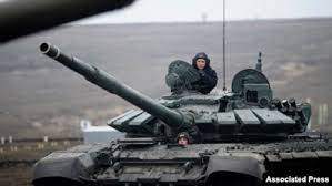 Associated Press - Russian troops take part in drills at the Kadamovskiy firing range in Russia's southern Rostov region, near the country's border with Ukraine, Dec. 14, 2021.