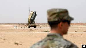 AP - A member of the U.S. Air Force stands near a Patriot missile battery at the Prince Sultan air base in al-Kharj, central Saudi Arabia, Feb. 20, 2020.